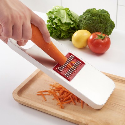 Multipurpose hand held etching flat cheese grater